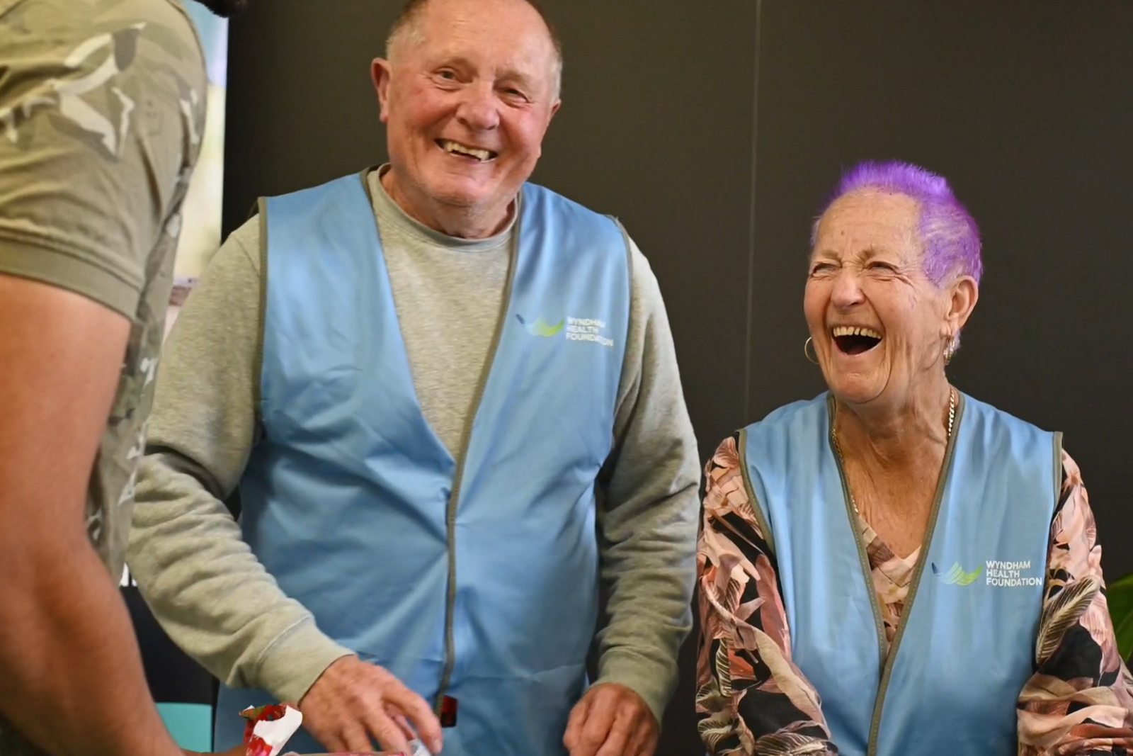 Volunteers wrapping Christmas gifts for children at Werribee Mercy Hospital